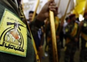 Sicherheitsvorkehrungen an einer Basis, da eine Irakische Gruppe droht mit US Attacken.