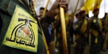 Sicherheitsvorkehrungen an einer Basis, da eine Irakische Gruppe droht mit US Attacken.